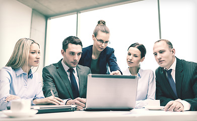 Image showing business team with laptop having discussion