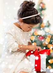 Image showing smiling little girl with gift box