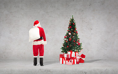 Image showing man in costume of santa claus with bag