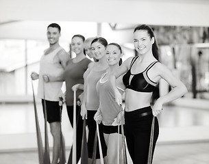 Image showing group of people working out with rubber bands