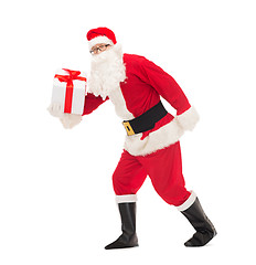 Image showing man in costume of santa claus with gift box