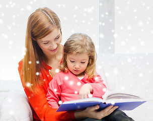 Image showing mother and daughter with book