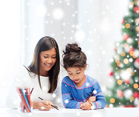 Image showing mother and daughter with coloring pencils indoors