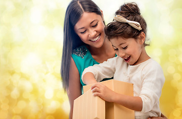 Image showing happy mother and child girl with gift box