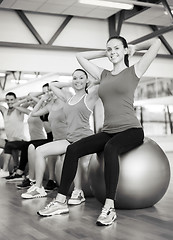 Image showing group of people working out in pilates class