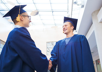 Image showing smiling students in mortarboards