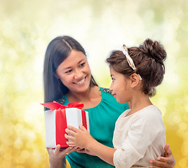 Image showing happy mother and child girl with gift box