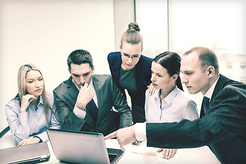 Image showing business team with laptop having discussion