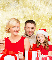 Image showing happy family with gift boxes