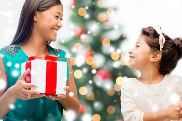 Image showing happy mother and child girl with gift box