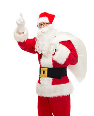 Image showing man in costume of santa claus with bag