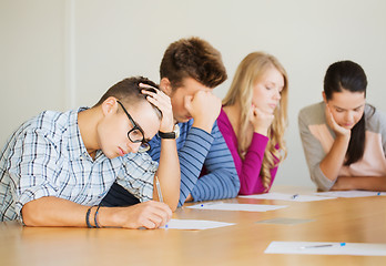 Image showing group of students with papers