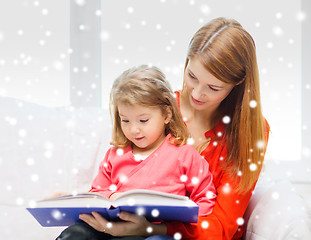 Image showing mother and daughter with book