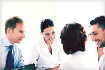 Image showing businesswoman with team on meeting in office