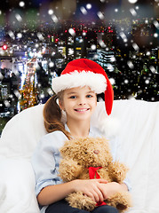 Image showing smiling little girl with teddy bear