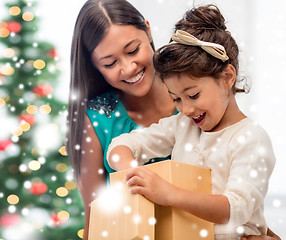 Image showing happy mother and child girl with gift box