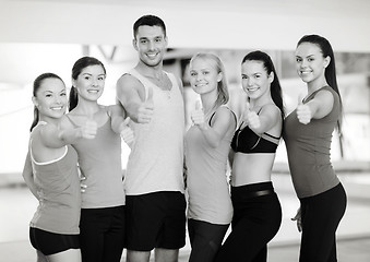 Image showing group of people in the gym showing thumbs up