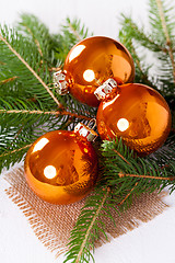 Image showing Shiny bright copper colored Christmas balls