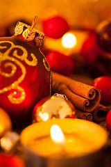 Image showing Warm gold and red Christmas candlelight background