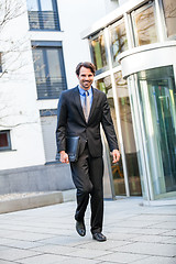 Image showing Businessman standing waiting for someone