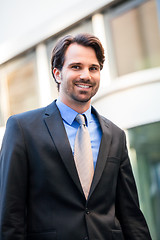 Image showing Businessman standing waiting for someone