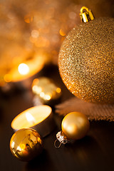 Image showing Warm gold and red Christmas candlelight background