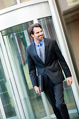 Image showing Businessman standing waiting for someone