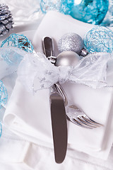 Image showing Stylish blue and silver Christmas table setting