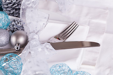 Image showing Stylish blue and silver Christmas table setting