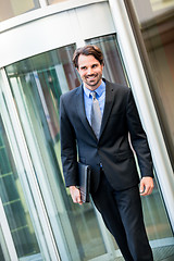 Image showing Businessman standing waiting for someone