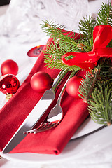 Image showing Red themed Christmas place setting