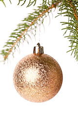 Image showing Christmas ball hanging from a branch of a fir tree