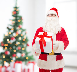 Image showing man in costume of santa claus with gift box