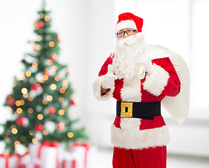 Image showing man in costume of santa claus with bag