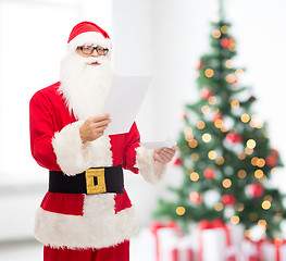 Image showing man in costume of santa claus with letter