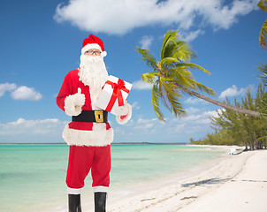 Image showing man in costume of santa claus with gift box