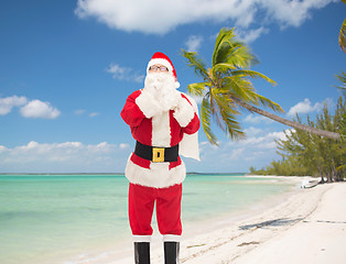 Image showing man in costume of santa claus with bag