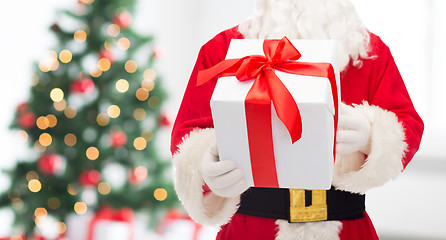 Image showing man in costume of santa claus with gift box