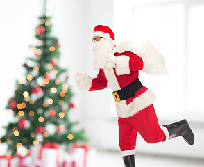 Image showing man in costume of santa claus with bag