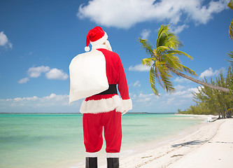 Image showing man in costume of santa claus with bag