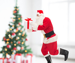 Image showing man in costume of santa claus with gift box