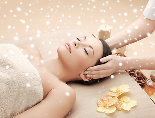 Image showing beautiful woman getting face or head massage