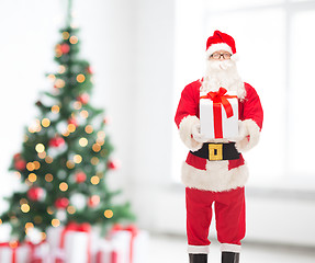 Image showing man in costume of santa claus with gift box