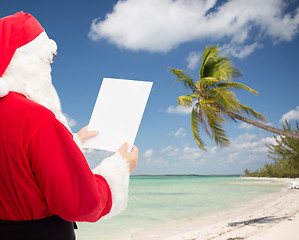 Image showing man in costume of santa claus with letter