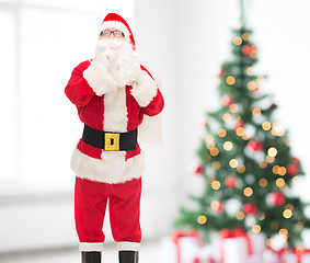 Image showing man in costume of santa claus with bag