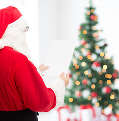 Image showing man in costume of santa claus with letter