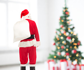 Image showing man in costume of santa claus with bag