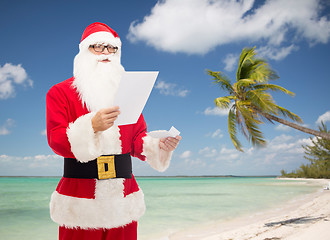 Image showing man in costume of santa claus with letter