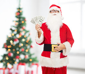 Image showing man in costume of santa claus with dollar money