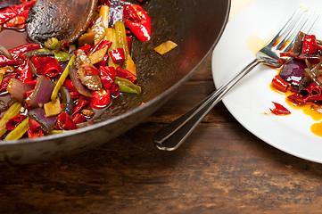 Image showing fried chili pepper and vegetable on a wok pan